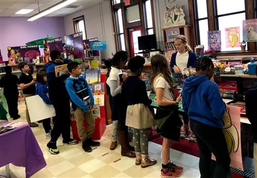 Students shopping at the book fair 