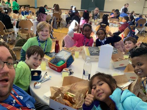 Mr. Moody eating luch with participating students at the 2019 ChoirFest 